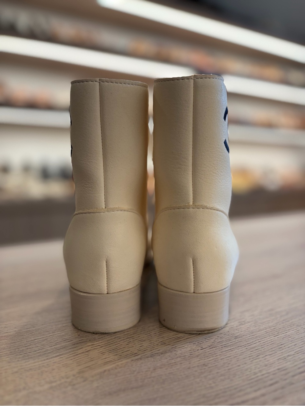 CHANEL Cream Leather Lace-Up Combat Boots with Navy CC - Picture 7 of 8